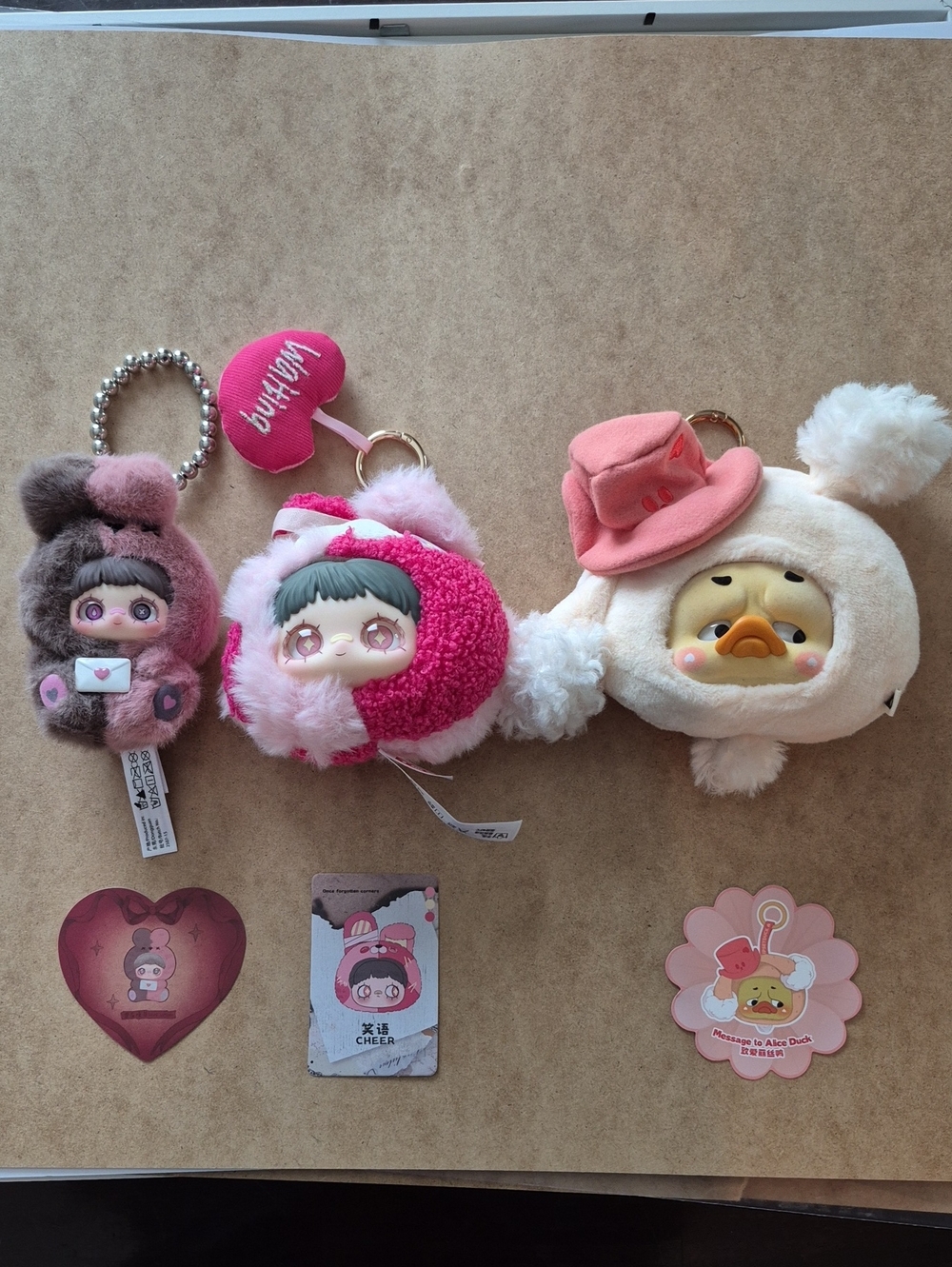 Maymei And Upset Duck Plush Character Keychain Set - Pink, Cream, Brown